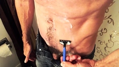 Lean daddy Richard shaves and strokes his cock