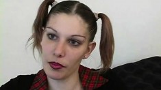 Kinky schoolgirl with pigtails puts her handjob abilities into action