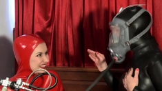 Latex lesbians probe their hot holes