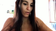 Brunette amateur babe strips off and masturbates