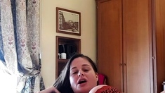 Busty curly brunette with big boobs fucks on couch