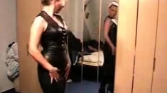 Lady putting on leather clothes